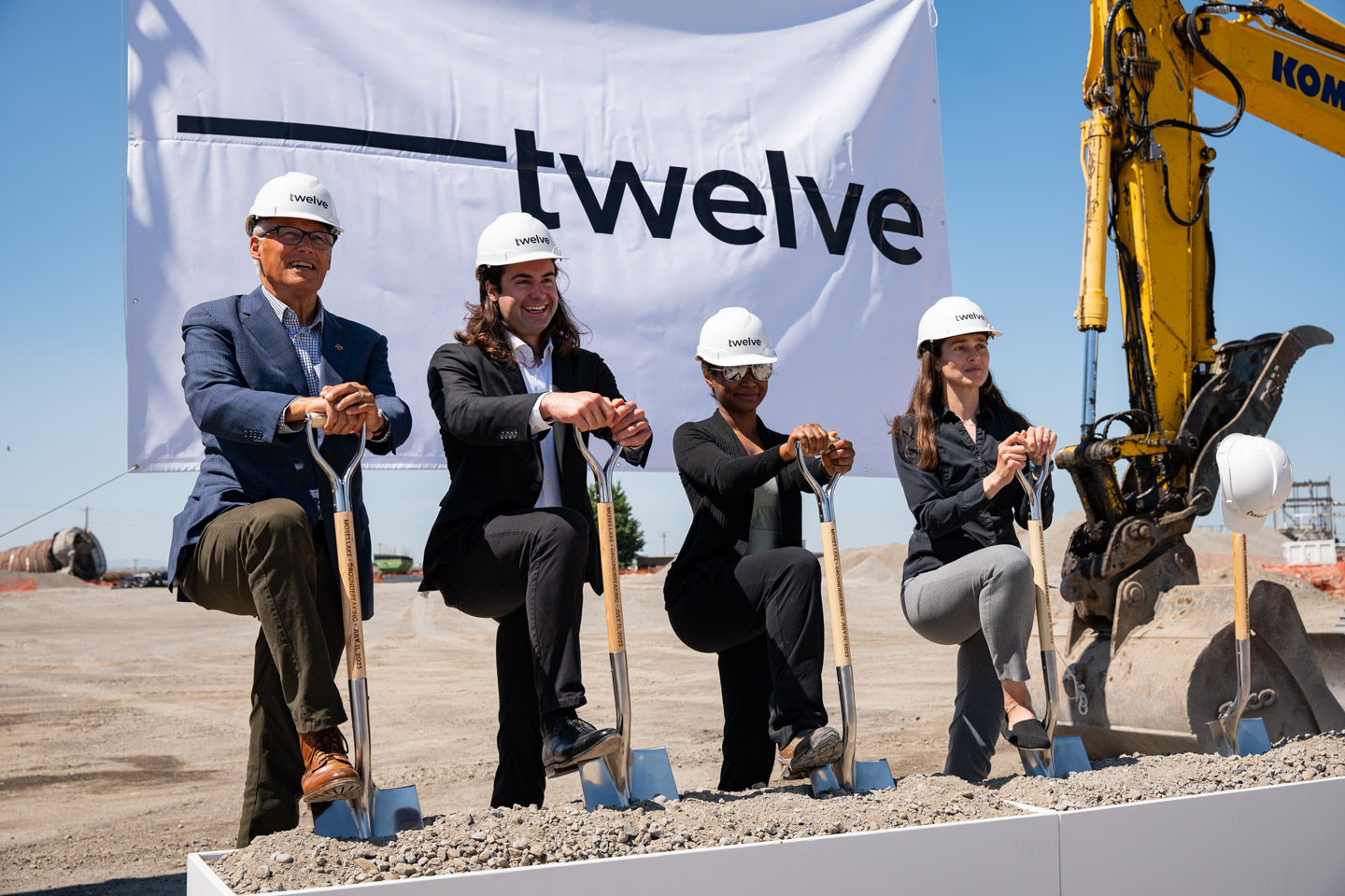 Gov. Jay Inslee and break ground on a construction site.